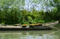 Cement boat by lake Royalty Free Stock Photo