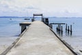 Cement bridge pier extending into the sea at Koh Samet in Thailand Royalty Free Stock Photo