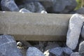 Cement Bumper in Granite Rocks Royalty Free Stock Photo