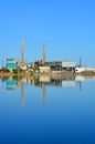 Cement factory reflected in the water