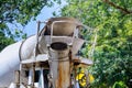 Cement truck mixer pouring fresh cement concrete Royalty Free Stock Photo