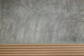 cement mortar wall texture with wooden headboard Royalty Free Stock Photo