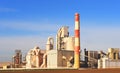 Cement plant with pipes. ement production process and Industrial solution. factory with smoke pipe. Chimney smokestack emission. Royalty Free Stock Photo