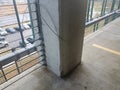 Cement post in parking garage with broken wire Royalty Free Stock Photo