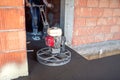 Cement smoothing and leveling trowel machinery with worker. flooring smoothing at new house construction site Royalty Free Stock Photo