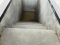 a cement staircase leading downwards Royalty Free Stock Photo
