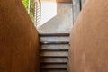 Cement stairs with sunlight in soil wall Royalty Free Stock Photo