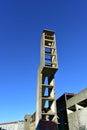 Abandoned building structure. Tower stairs in ruins. Sunny day.