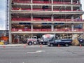 Cement truck mixer in front of a construction site at the corner of Bellevue Way and NE 2nd Street downtown, near Safeway grocery Royalty Free Stock Photo