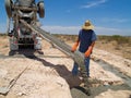 Cement Truck Pouring Cement into Hole - Horizontal