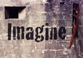 Cement wall with the word Imagine Royalty Free Stock Photo