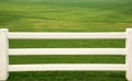 Cement white fence , White fence , grass. Royalty Free Stock Photo