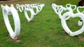 Cement White Heart Shape Artificial, Built on Grass Green Background Royalty Free Stock Photo