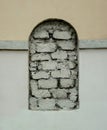 Clogged window with cinder block Royalty Free Stock Photo