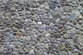 Cemented small pebble round stone rock wall or floor Royalty Free Stock Photo