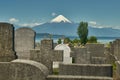 Cementery at Llanguihue lake and Osorno Volcano, Puerto Varas, Chile, South America. Royalty Free Stock Photo