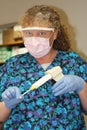 Cementing dental crown Royalty Free Stock Photo