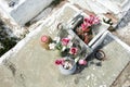 cemetary, tombestone and grave with plastic flowers. Latin America Royalty Free Stock Photo