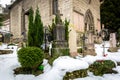 Cemetery covered by snow at old churchyard Royalty Free Stock Photo