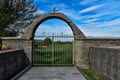 Old iron door-cemetery entrance gate Royalty Free Stock Photo