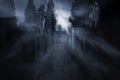 Cemetery in a foggy full moon night Royalty Free Stock Photo