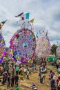 cemetery with giant colorful circular kites with drawings, and with many people, Royalty Free Stock Photo