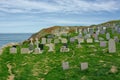 Cemetery With Headstones Overlooking The Ocean.