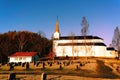 Cemetery with old wooden church Royalty Free Stock Photo