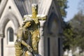 Cemetery Statue of Woman with Cross