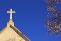 Cemetery stone cross under blue sky Royalty Free Stock Photo