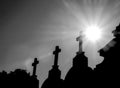 Cemetery stone cross under blue sky Royalty Free Stock Photo