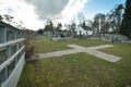 Cemetery with tombstones in the shape of a cross, angels. Many decorated graves