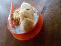 Cendol Durian or Durian Dessert closeup on wooden background.Cendol Durian is Malaysian popular sweets dessert.