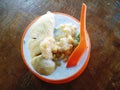 Cendol Durian or Durian Dessert closeup on wooden background.Cendol Durian is Malaysian popular sweets dessert.