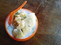 Cendol Durian or Durian Dessert closeup on wooden background.Cendol Durian is Malaysian popular sweets dessert.