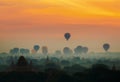 Cenic sunrise with many hot air balloons above Bagan in Myanmar Royalty Free Stock Photo