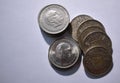 Cenital view of a pile of five peseta coins from 1949 and white background Royalty Free Stock Photo