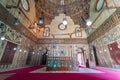 Mausoleum at Mamluk era Mosque and Madrasa of Sultan Hassan with colorful marble mosaic, and carved inscription, Cairo