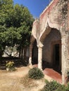 Ruins of a Mexican mansion rest above an ancient cenote or underground, water filled caverns.