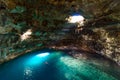 Cenote Samula Dzitnup near Valladolid, Yucatan, Mexico - swimming in crystal blue water Royalty Free Stock Photo