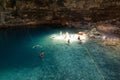 Cenote Samula with people swimming