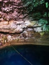 Cenote Tankach Ha sinkhole limestone rocks turquoise water Coba Mexico Royalty Free Stock Photo