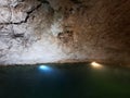 The Cenotes in Yucatan, Mexico with sedimentary rocks that infiltrate rainwater and form large caverns or water reservoirs