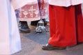 Censer incense burner at the feet of altar assistants