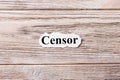 Censor of the word on paper. concept. Words of Censor on a wooden background