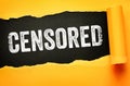 CENSORED message displayed on torn paper background with bold distressed typography. Concept for restriction, control, prohibition Royalty Free Stock Photo