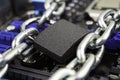 Censorship, restrictions and restrictions on a Internet. concept, motherboard in chains under lock and key Royalty Free Stock Photo