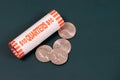 25 cent coins on a dark background, quarter dollar USA, laundromat coins Royalty Free Stock Photo