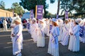 Women in vintage dresses marching at Rose Parade