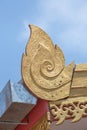 Center focus of golden lai thai pattern on the red roof of buidling in the public location wat sareesriboonkam temple of lampoon Royalty Free Stock Photo